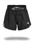 ALL CORNERS Women's Shorts in black, front view on an invisible mannequin — branded ADAPT • EVOLVE • PERFORM waistband strap and white AC mark