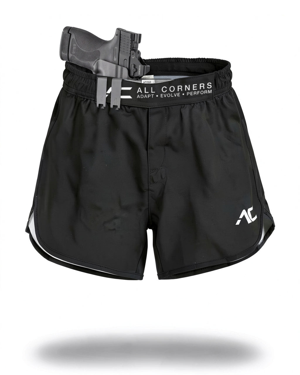 ALL CORNERS Women's Shorts in black with a holstered pistol clipped to the patent-pending front waistband (holster and firearm not included)