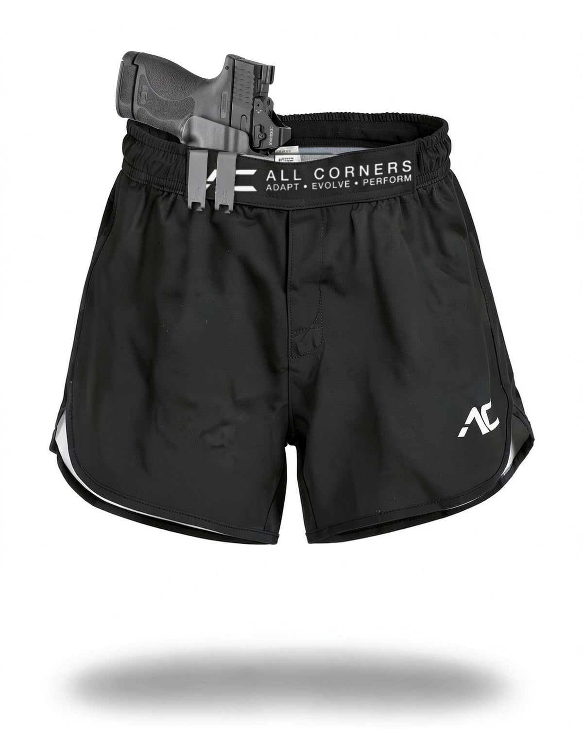 ALL CORNERS Women's Shorts in black with a holstered pistol clipped to the patent-pending front waistband (holster and firearm not included)